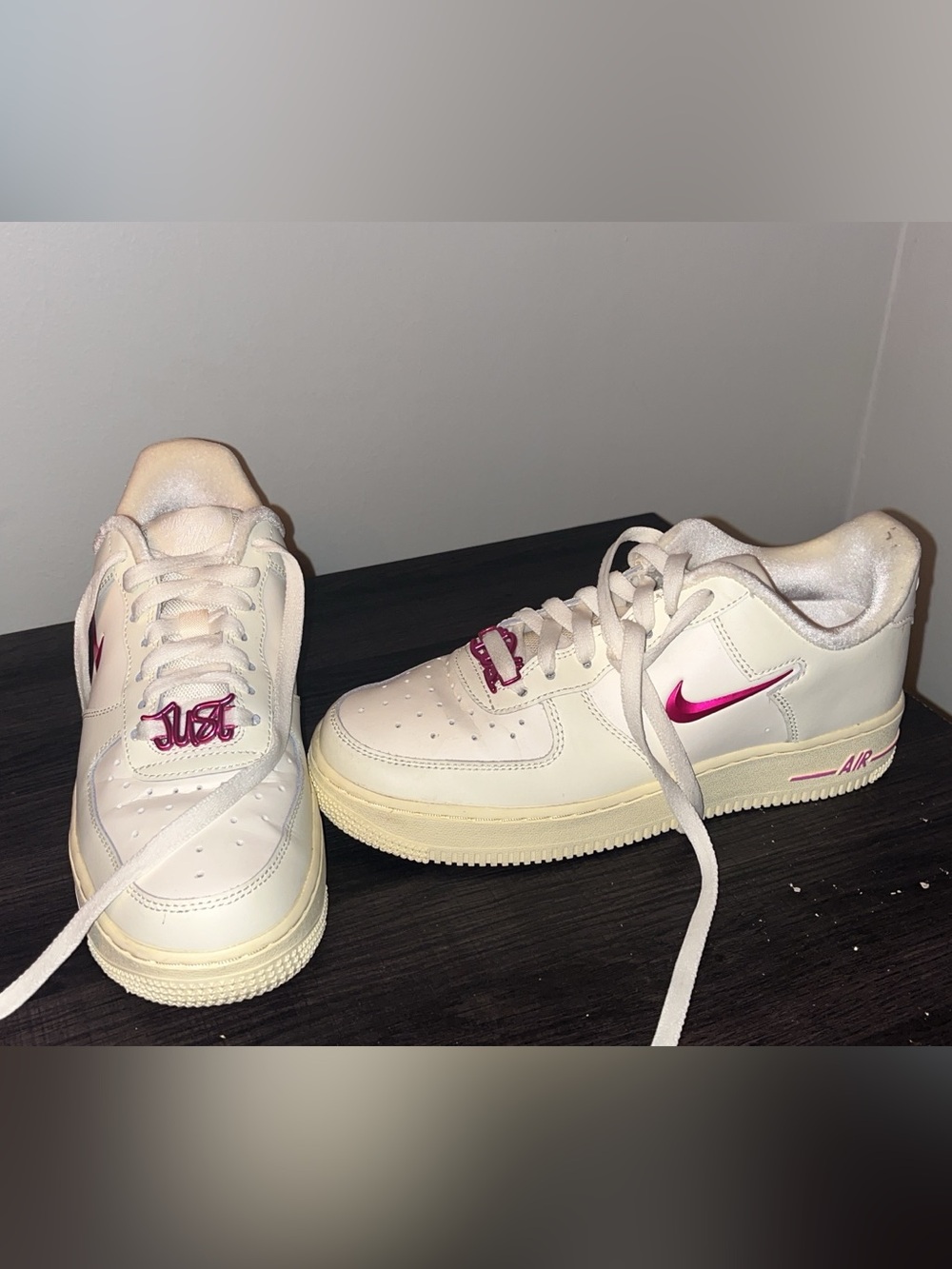 Nike White/Cream Air Force One Low-Top Sneakers with Pink Swoosh
